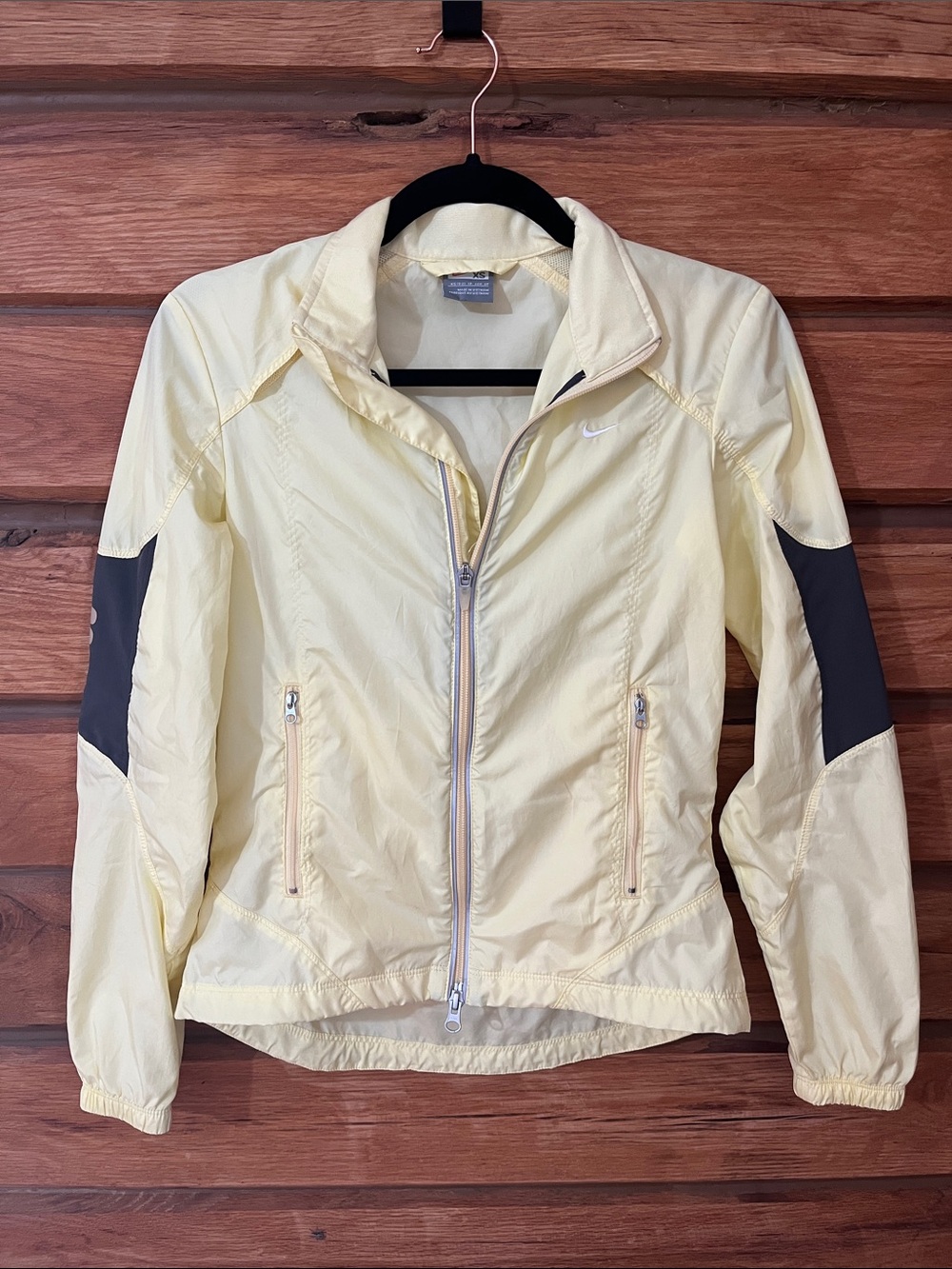 Nike Women's Pale Yellow Utility Windbreaker with Gray Elbow Panels